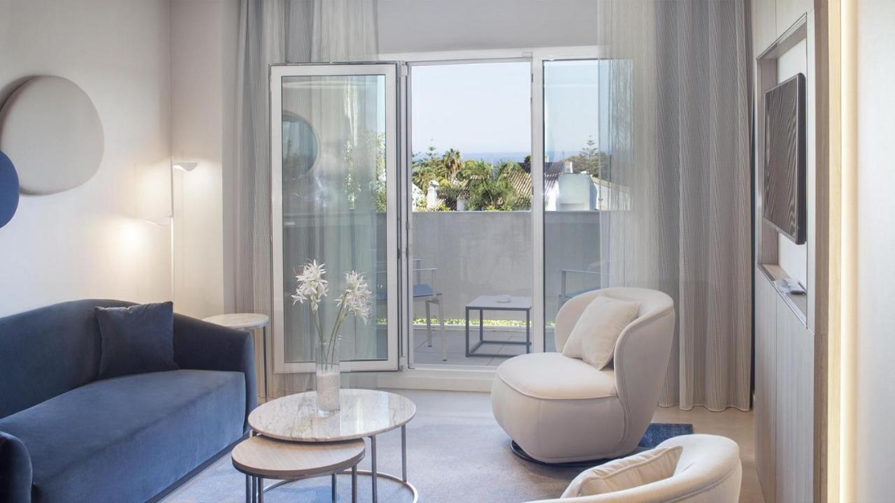 Alanda Marbella Hotel Bagian luar foto A typical apartment